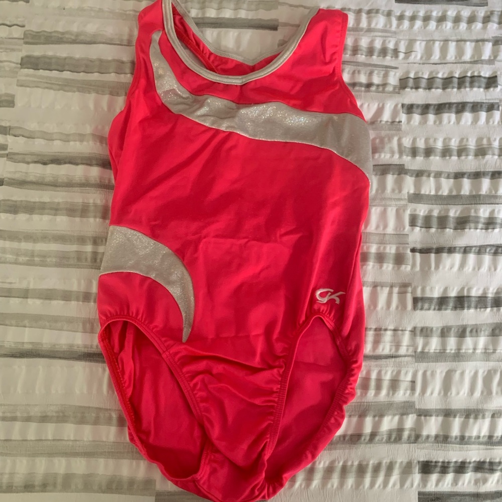 Coral and white GK racerback leotard in size Adult Large (AL)
